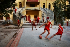 Steve McCurry, Monks Play Football, Burma, 2010