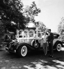Sid Avery, Efram Zimbalist Jr. with FAmily and 1934 Packard Pheaton, 1961