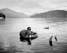 Rodney Smith, James in Innertube with Duck, Lake Placid, New York, 2006